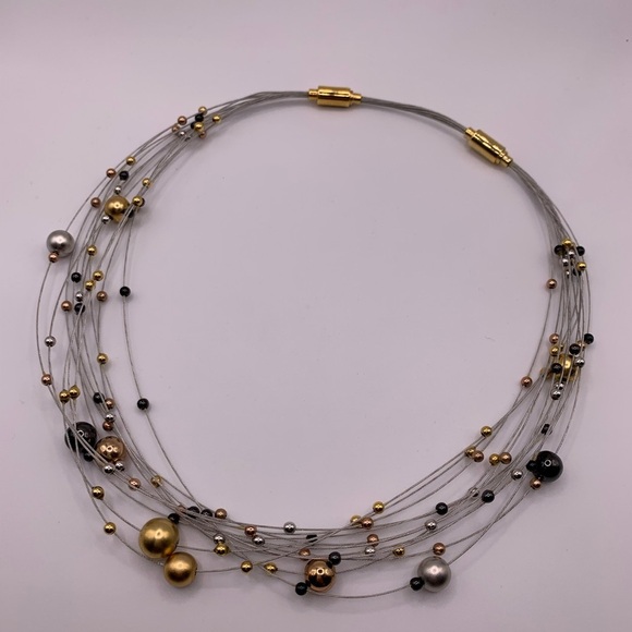 Funky multi strand adjustable necklace with gold and silver tone beads - Picture 4 of 7